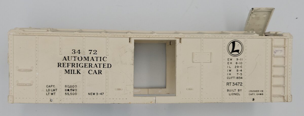 Lionel 3472-61 White Milk Car Shell w/ Operating Hatch and Broken Door Frames