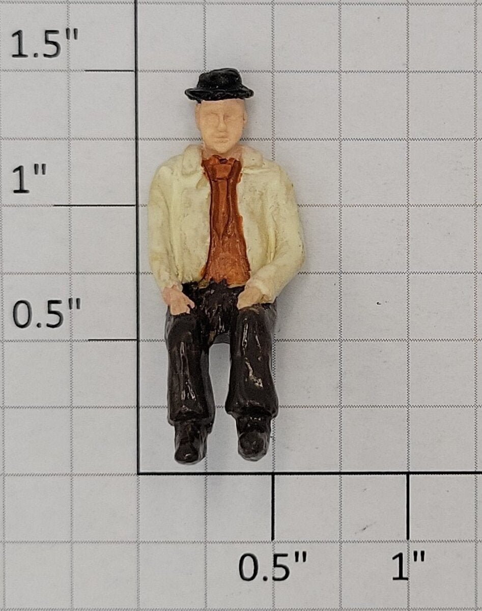 Acme 0804-21 O Gauge Painted Sitting Passenger Figure with Black Hat