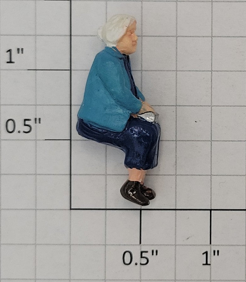 Acme 0823-21 O Gauge Elderly Female Sitting Passenger in Blue Outfit