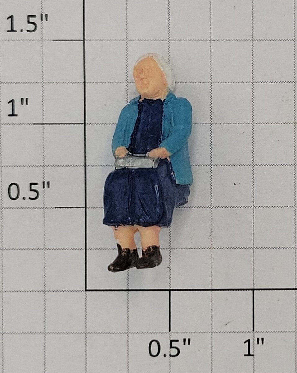 Acme 0823-21 O Gauge Elderly Female Sitting Passenger in Blue Outfit