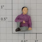 Acme 0827-21 O Gauge Male Sitting in Purple Shirt and Gray Pants