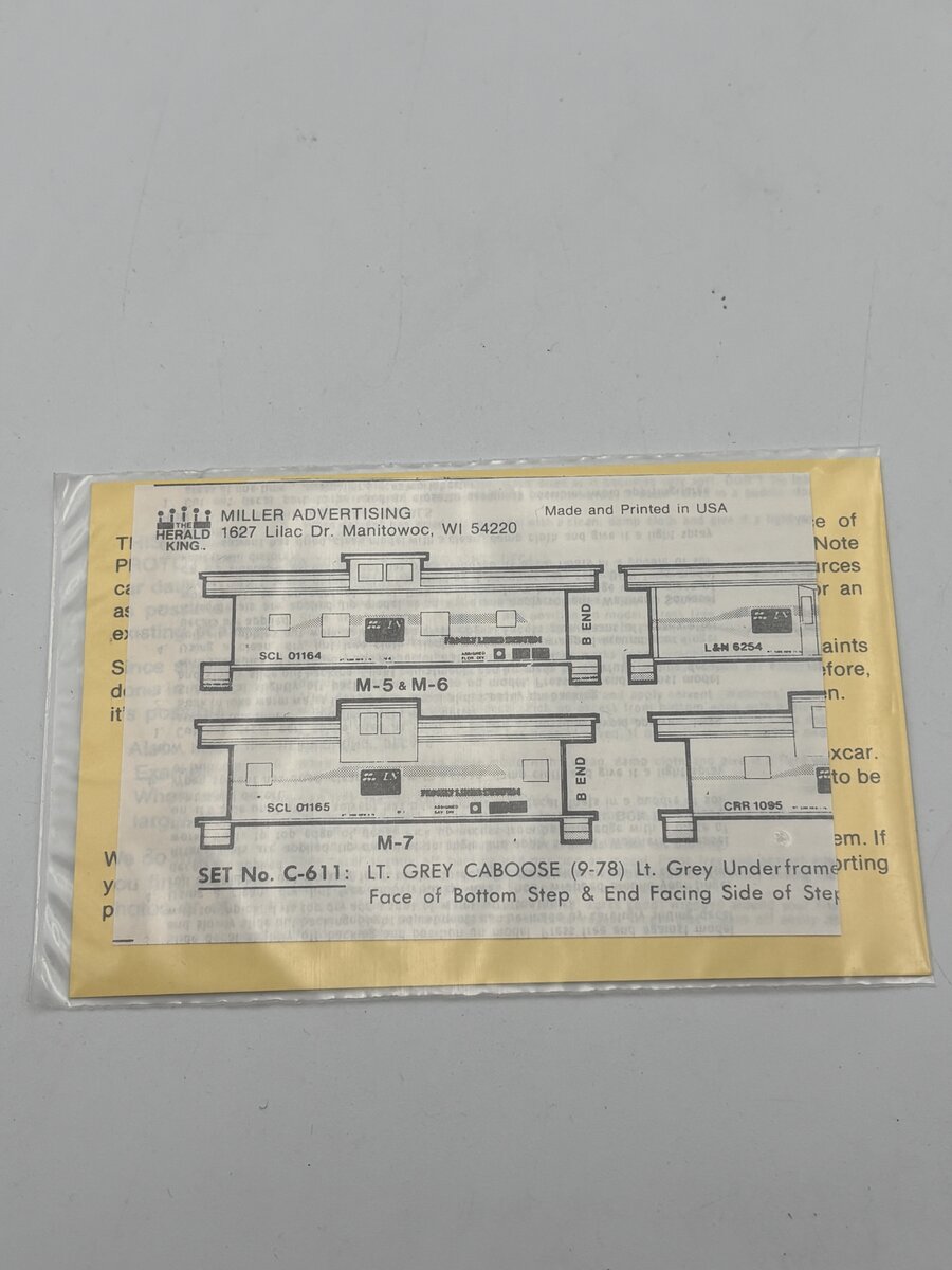 The Herald King C-611 HO LT. Grey Caboose Red, Yellow, And White Lettering Decal