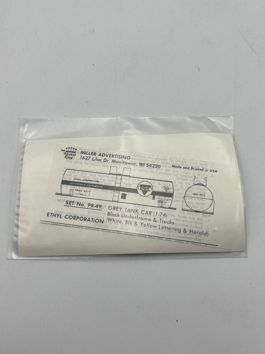 The Herald King PR-49 HO Grey Tank Car White, Black And Yellow Lettering Decal