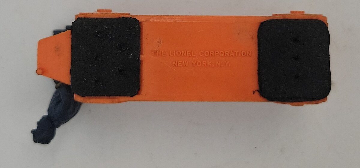 Lionel 356-35 O Gauge Orange Baggage Cart with Unpainted Figure - Minor Damage