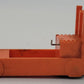 Lionel 356-35 O Gauge Orange Baggage Cart with Unpainted Figure - Minor Damage