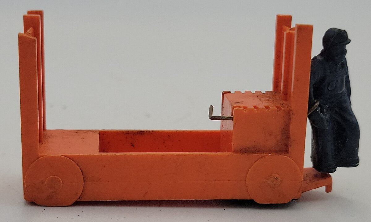 Lionel 356-35 O Gauge Orange Baggage Cart with Unpainted Figure - Minor Damage