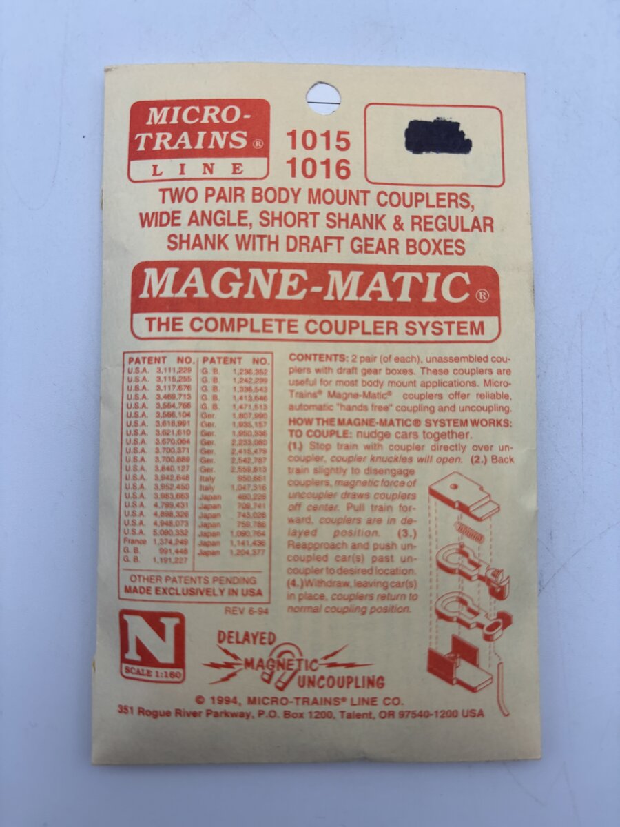 Micro-Trains 1015-1016 N Two Pair Body Mount Couplers With Draft Gear Boxes