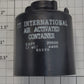 Acme 61125B O Gauge Black with White "TT International" Lettering Canister