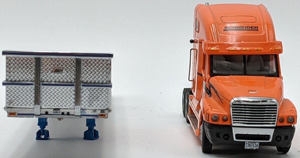 Sword Models 1:50 Scale Schneider Freightliner & Flatbed w/2 Large Pipes Load