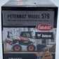 Ertl 164460TP 1:64 Peterbilt Model 579 w/Flatbed & Bobcat S76 Skid-Steer Loaders