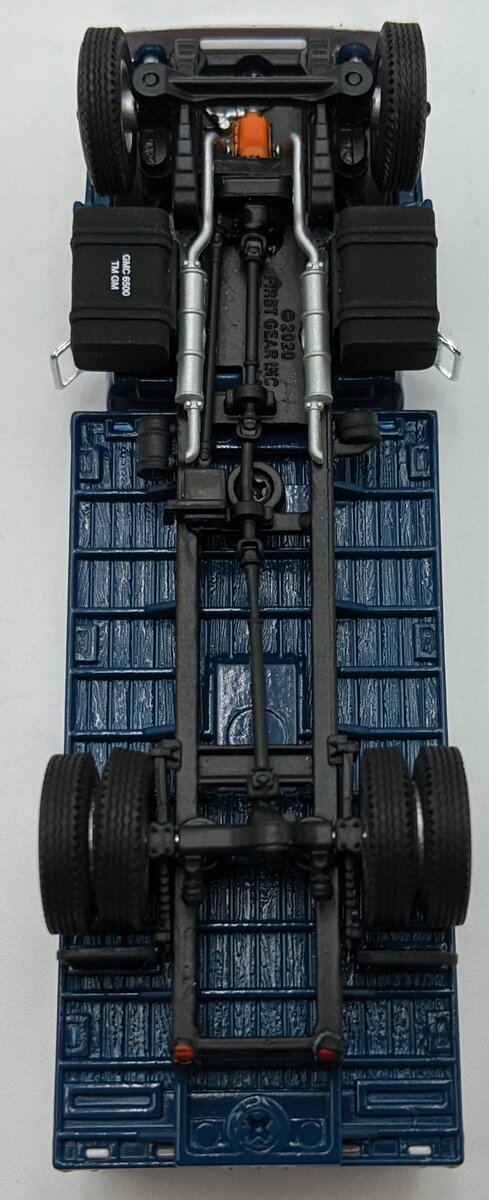 First Gear 60-0965 1:64 GMC 6500 W/Single Axle Stake Body White/Blue