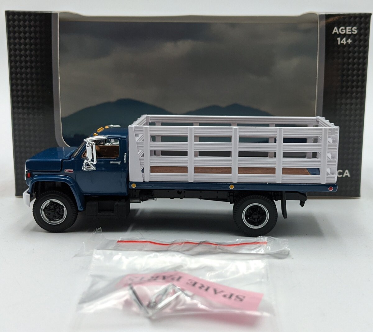 First Gear 60-0965 1:64 GMC 6500 W/Single Axle Stake Body White/Blue