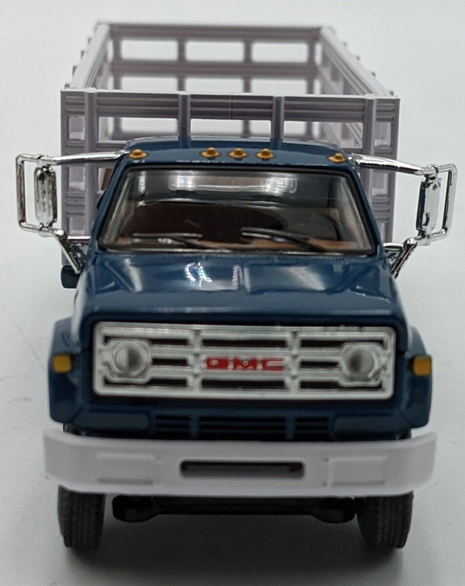First Gear 60-0965 1:64 GMC 6500 W/Single Axle Stake Body White/Blue