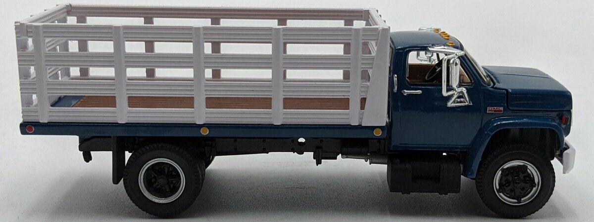 First Gear 60-0965 1:64 GMC 6500 W/Single Axle Stake Body White/Blue