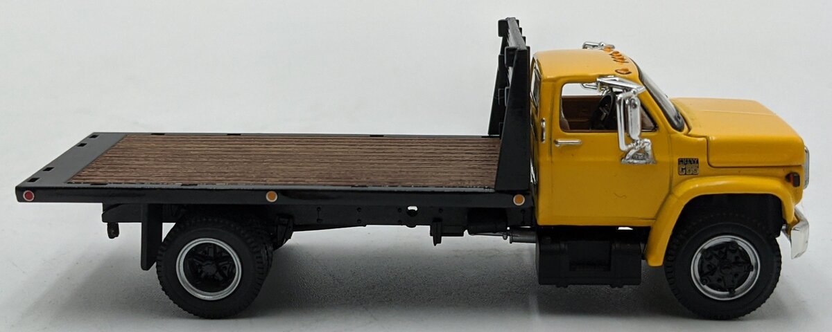 First Gear 60-0923 1:64 Chevrolet C65 W/Single Axle Flatbed Yellow/Black