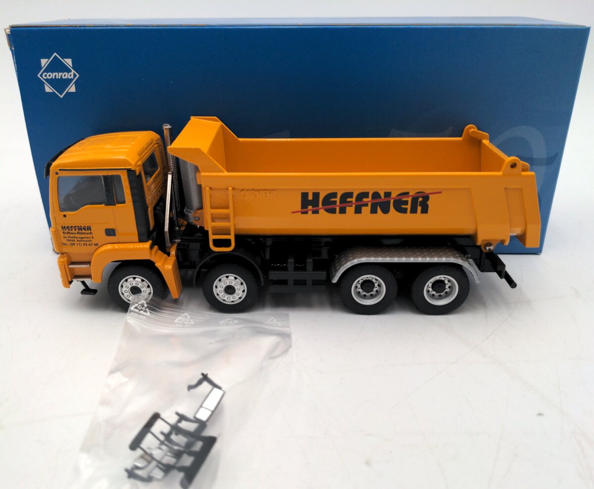 Conrad 75129 1:50 MAN TGS M Euro 5 4-Axle w/Carnehl Half Pipe Dump Truck