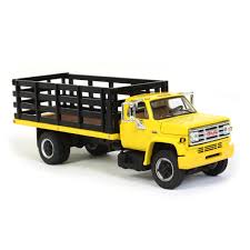 First Gear 60-0966 1:64 Scale GMC 6500 Single Axle Stake Truck Yellow & Black