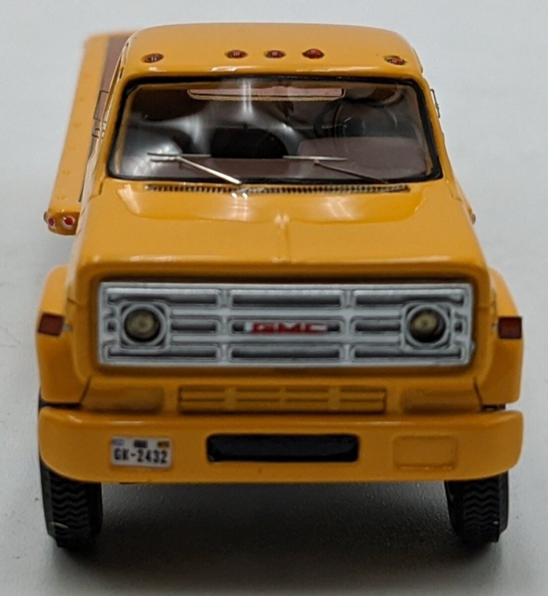 ADC ADC30103 1:64 Chevrolet C-65 Flatbed Truck 1975 Yellow