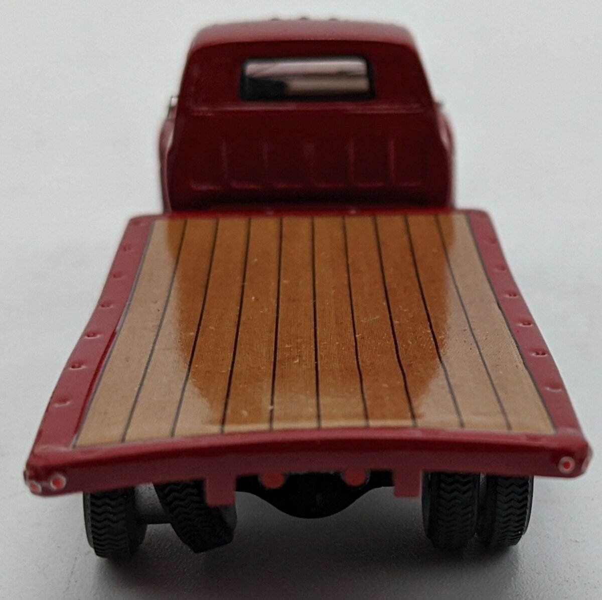 ADC ADC30100 1:64 Chevrolet C-65 Flatbed Truck 1975 Red