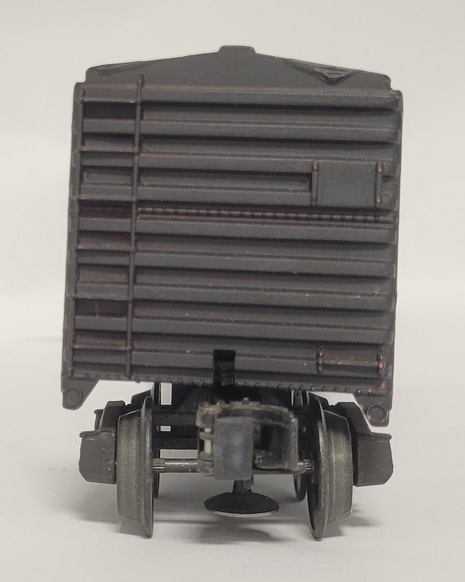 Lionel 6470-14 Repainted Black Exploding Boxcar Frame with Trucks and Ends
