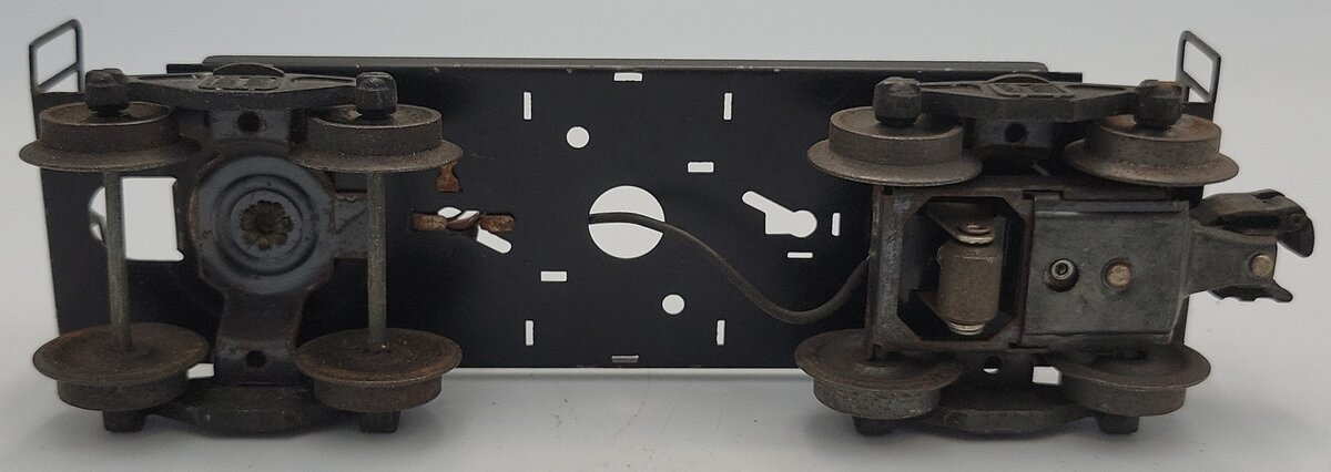 Lionel 6257-11 O Gauge Caboose Frame with Operating Coupler Truck & Lamp Socket