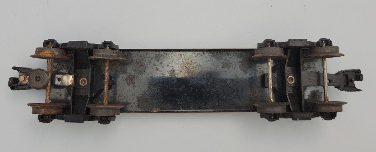 Lionel 6464-11 O Gauge Black Boxcar Frame with One Hole & One Operating Coupler