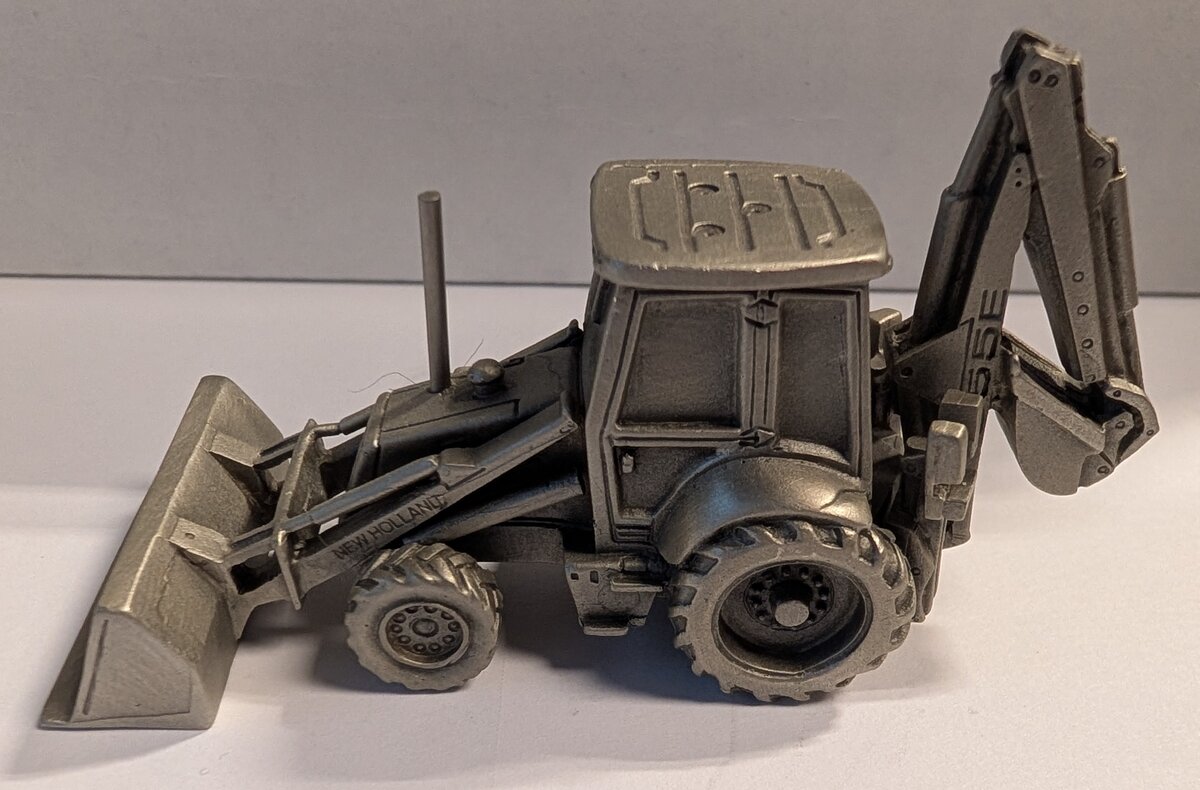New Holland 555E Tractor Loader Backhoe Promotional Pewter Scale Model