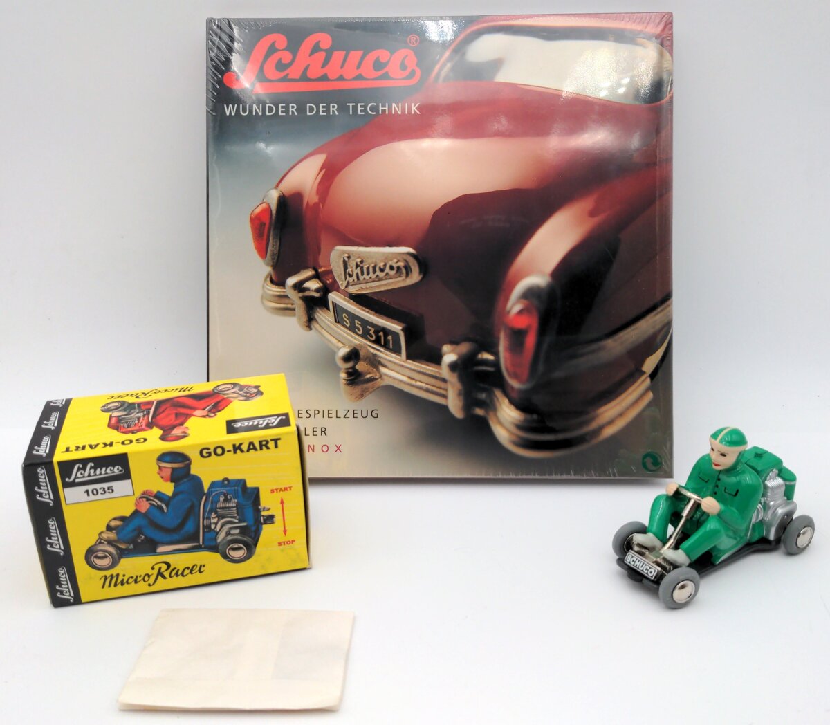 Schuco 02145 Wunder Der Technik Book & Wind-Up Racer Go-Kart Set