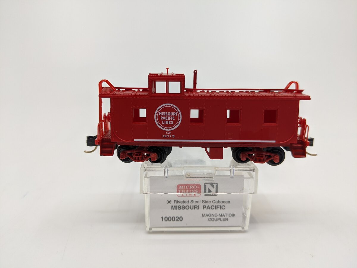 Micro-Trains 10000020 N Missouri Pacific 36' Riveted Steel Side Caboose #13075 LN/Box