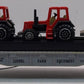 Lionel 6-16907 O Gauge Flatcar with 3 Farm Tractors LN/Box