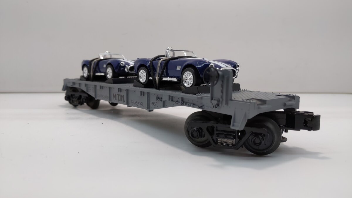 MTH 30-7660 O Gauge MTH Auto Transport Flatcar with Ertl '65 Shelby Cobra's EX/Box