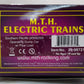 MTH 20-98721 O Southern Pacific Operating Dump Car w/Pipe Load #389250