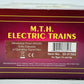 MTH 20-91582 O Milwaukee Road N-6b Caboose with Operating Signal Man #0328