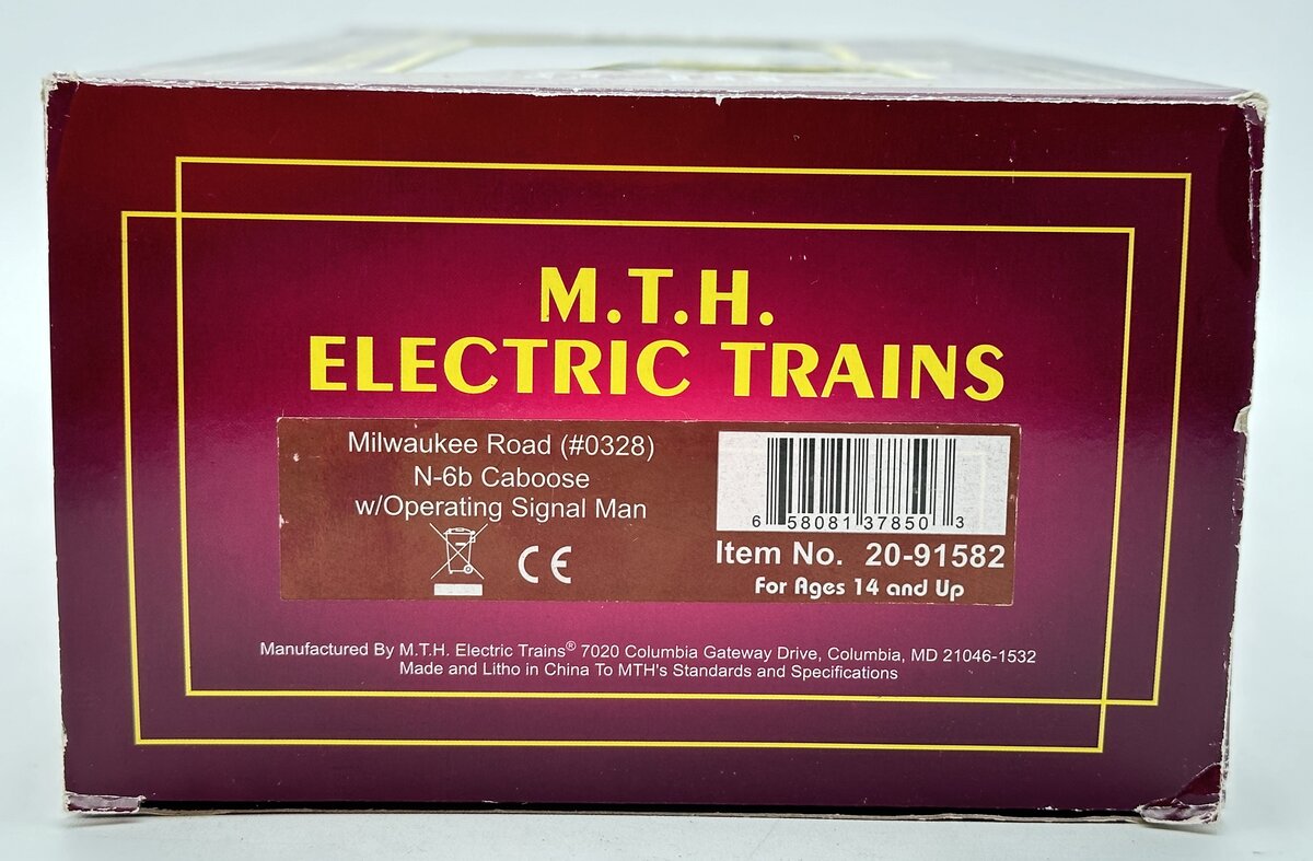 MTH 20-91582 O Milwaukee Road N-6b Caboose with Operating Signal Man #0328