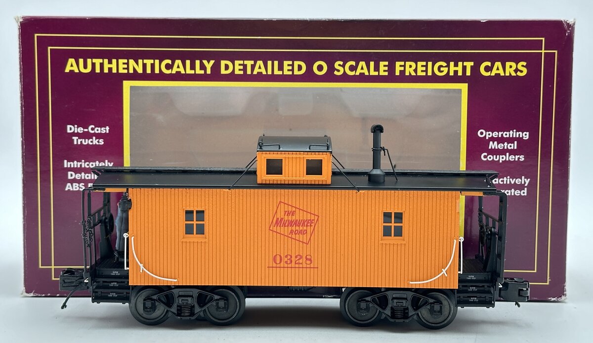 MTH 20-91582 O Milwaukee Road N-6b Caboose with Operating Signal Man #0328