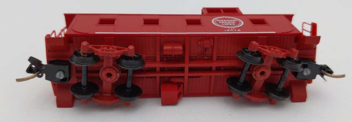 Micro-Trains 10000020 N Missouri Pacific 36' Riveted Steel Side Caboose #13075 LN/Box