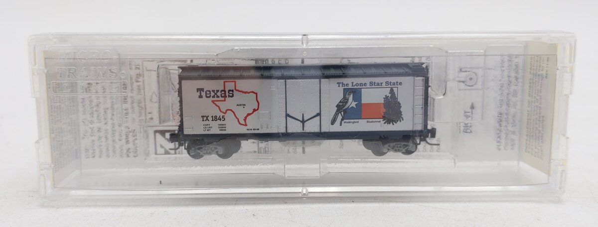 MicroTrains 50200503 Z Scale Texas 40' Standard Plug Door Boxcar #1845 EX/Box