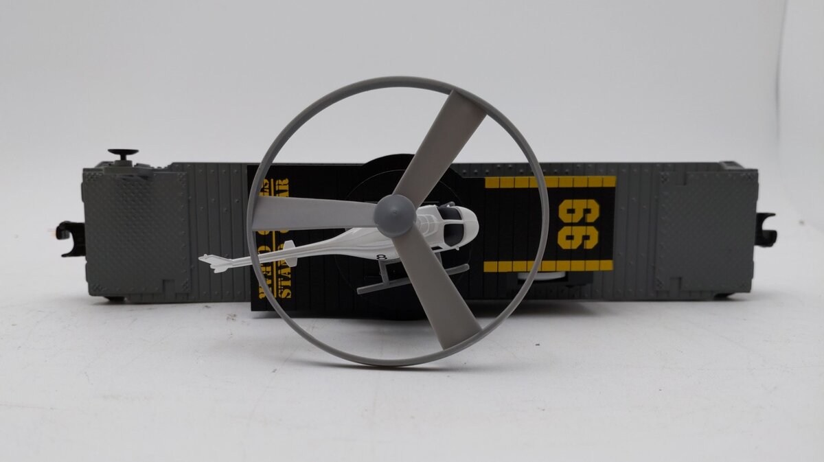 MTH 30-7658 O Gauge MTH Flatcar w Operating Helicopter LN/Box