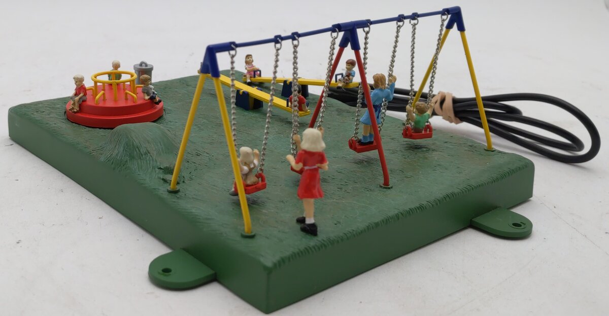 知育玩具セット Play Along! Lionel 6-82104 O Lionellville Plug-n' Playtime Animated Playground