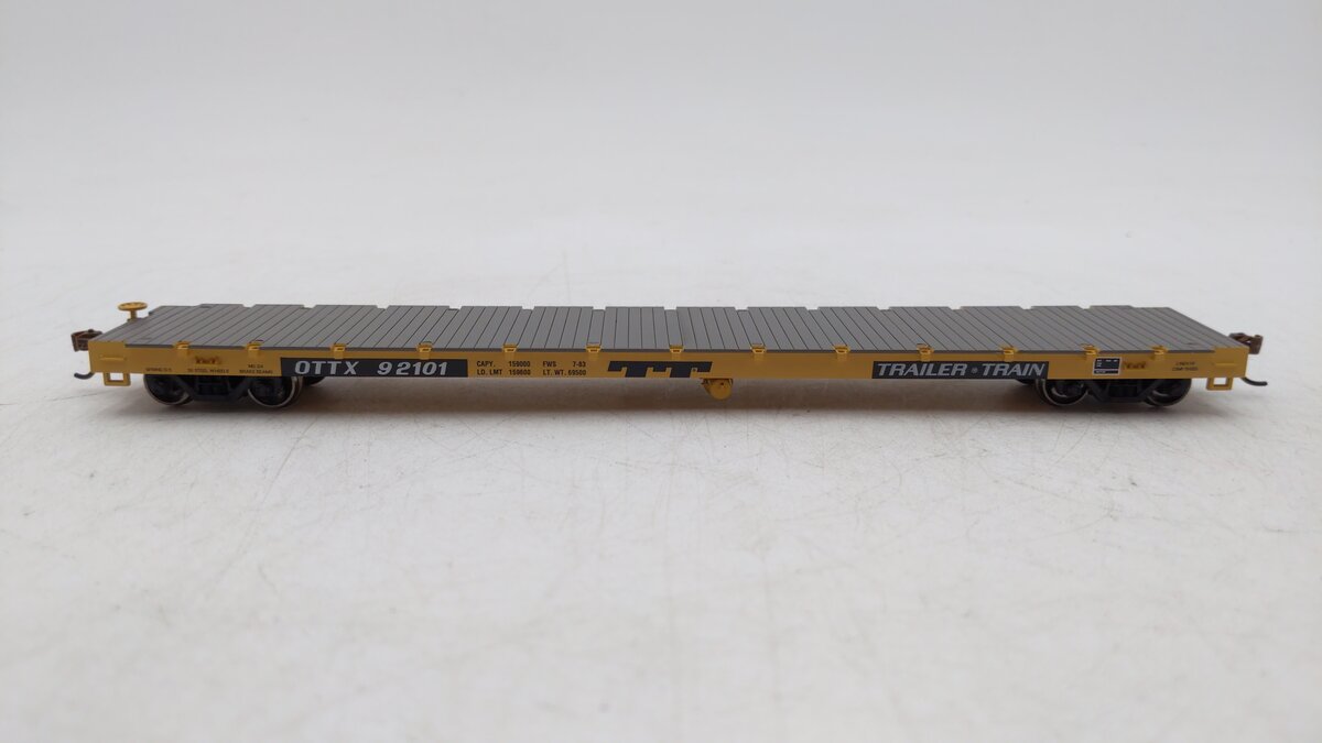 Athearn 92694 HO TTX 60' Ready-to-Run Brown Flat Car #92101- Kadee Couplers