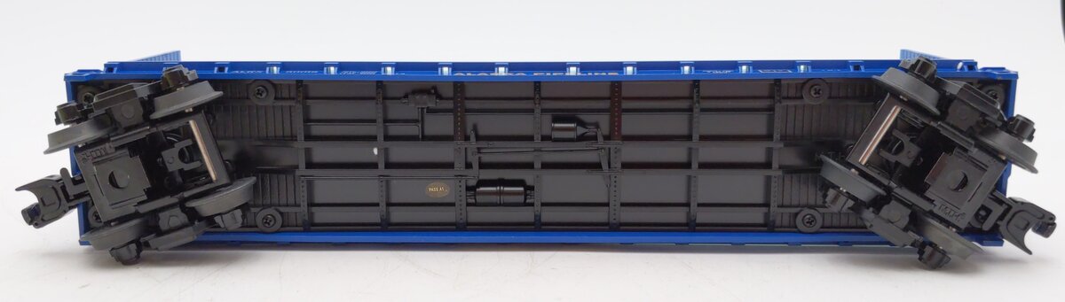 MTH 30-76713 O Alaska Pipeline Flat Car with Bulkheads and Pipe Load #50018