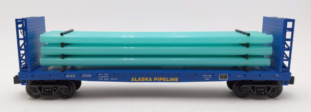 MTH 30-76713 O Alaska Pipeline Flat Car with Bulkheads and Pipe Load #50018