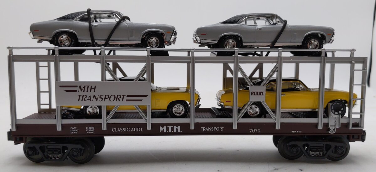 MTH 30-7694 O Gauge MTH Auto Carrier with 4 Die-Cast 1970 Chevy Nova's LN/Box