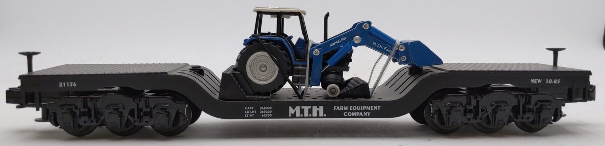 MTH 30-7622 O Gauge Depressed Center Flat w/ Ertl New Holland Tractor #21136 NIB