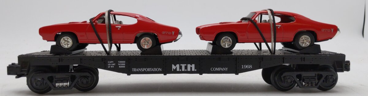 MTH 30-7639 O Gauge MTH Auto Transportation Flatcar with 2 Ertl '68 GTOs #1968 LN/Box