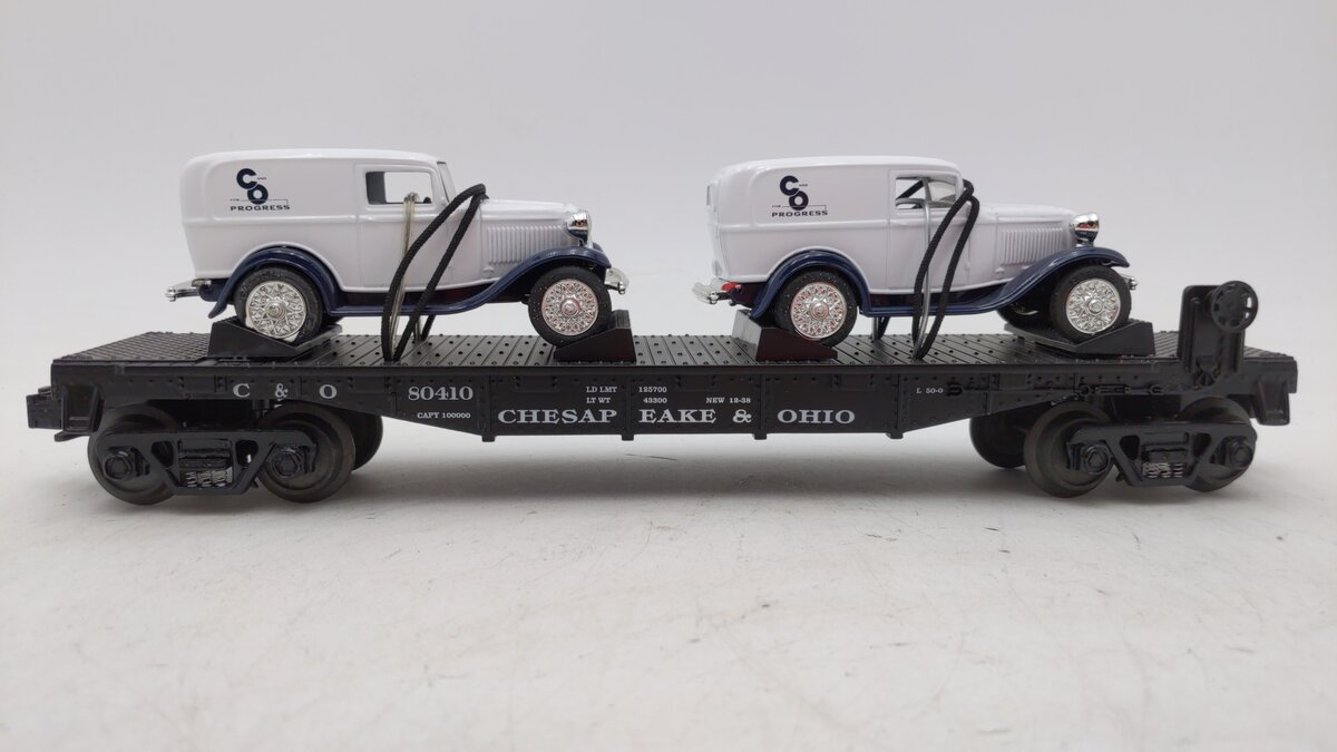 MTH 30-8304 O Chesapeake & Ohio Diecast Flatcar w/ 1932 Ertl Panel Vans #80410 LN/Box