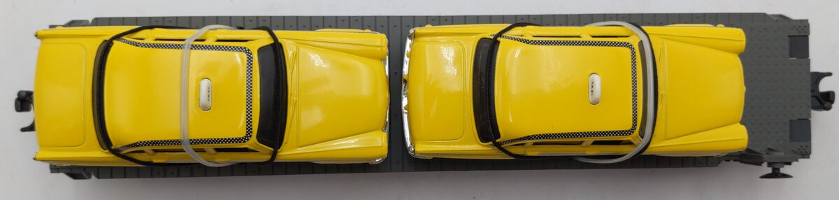 MTH 30-7625 O Gauge MTH Auto Transport Flatcar w/ Ertl Checker Cabs #1959 LN/Box
