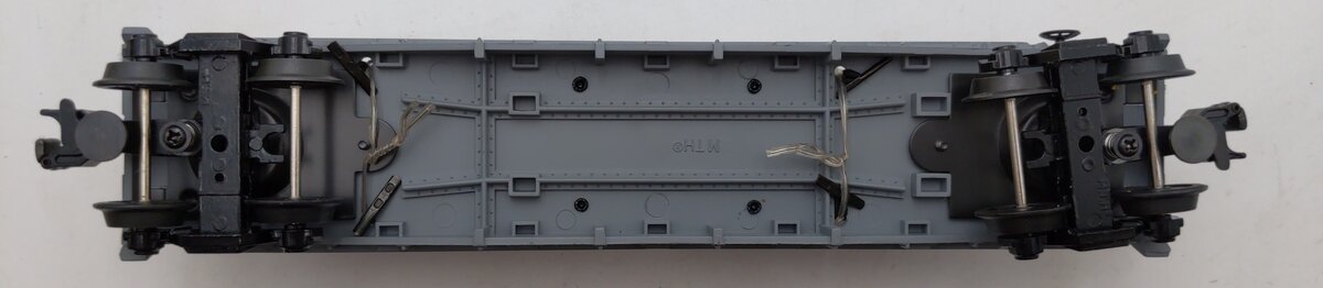 MTH 30-7647 O Gauge Auto Flatcar with 2 Ertl 1950 Panel Trucks NIB