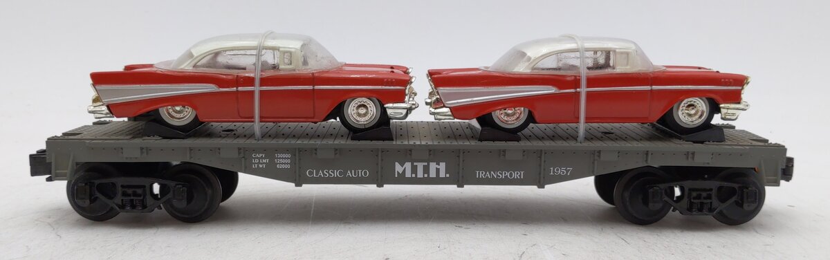 MTH 30-7610 O Gauge MTH Lines Flat Car with 2 Red Ertl '57 Chevys LN/Box