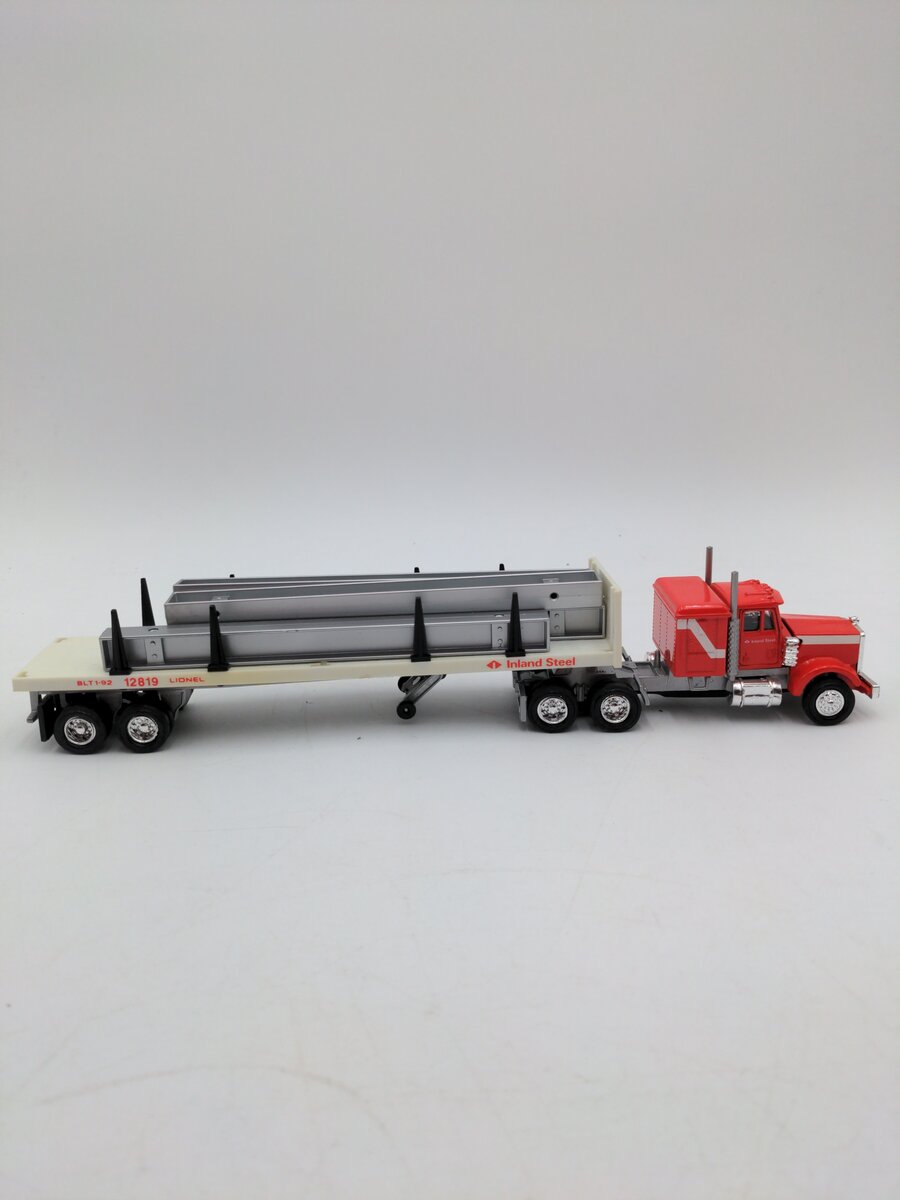 Lionel 6-12819 O Gauge Inland Steel Flatbed Tractor Trailer W/Stakes #12819 EX/Box